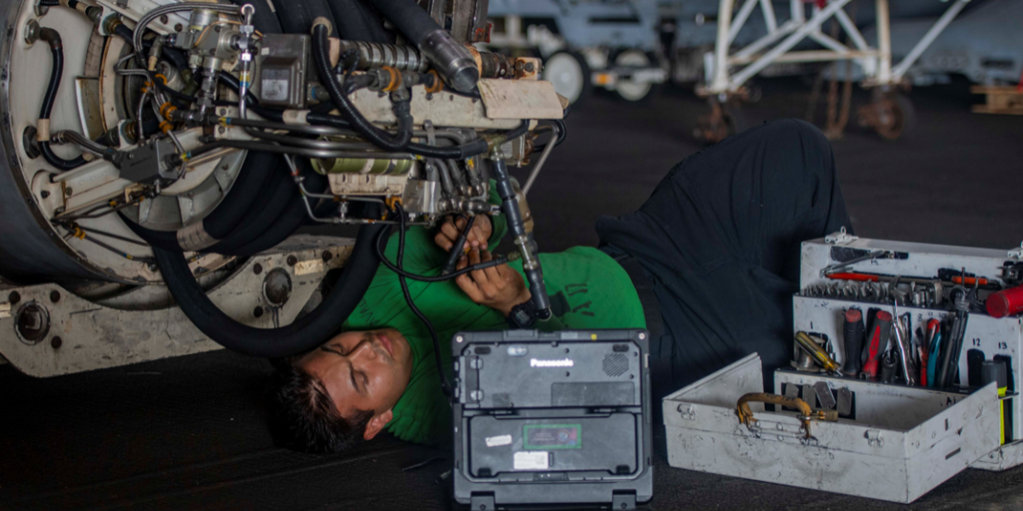 NAVAIR maintenance photo ARABIAN GULF (Dec. 6, 2023) Aviation Machinist's Mate 3rd Class Carlos Avalos conducts maintenance on an aerial refueling store aboard the aircraft carrier USS Dwight D. Eisenhower (CVN 69) in the Arabian Gulf, Dec. 6, 2023. The Dwight D. Eisenhower Carrier Strike Group is deployed to the U.S. 5th Fleet area of operations to support maritime security and stability in the Middle East region (source: NAVAIR).