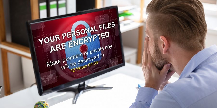 Source: https://www.shutterstock.com/image-photo/worried-businessman-looking-computer-ransomware-word-1407725624